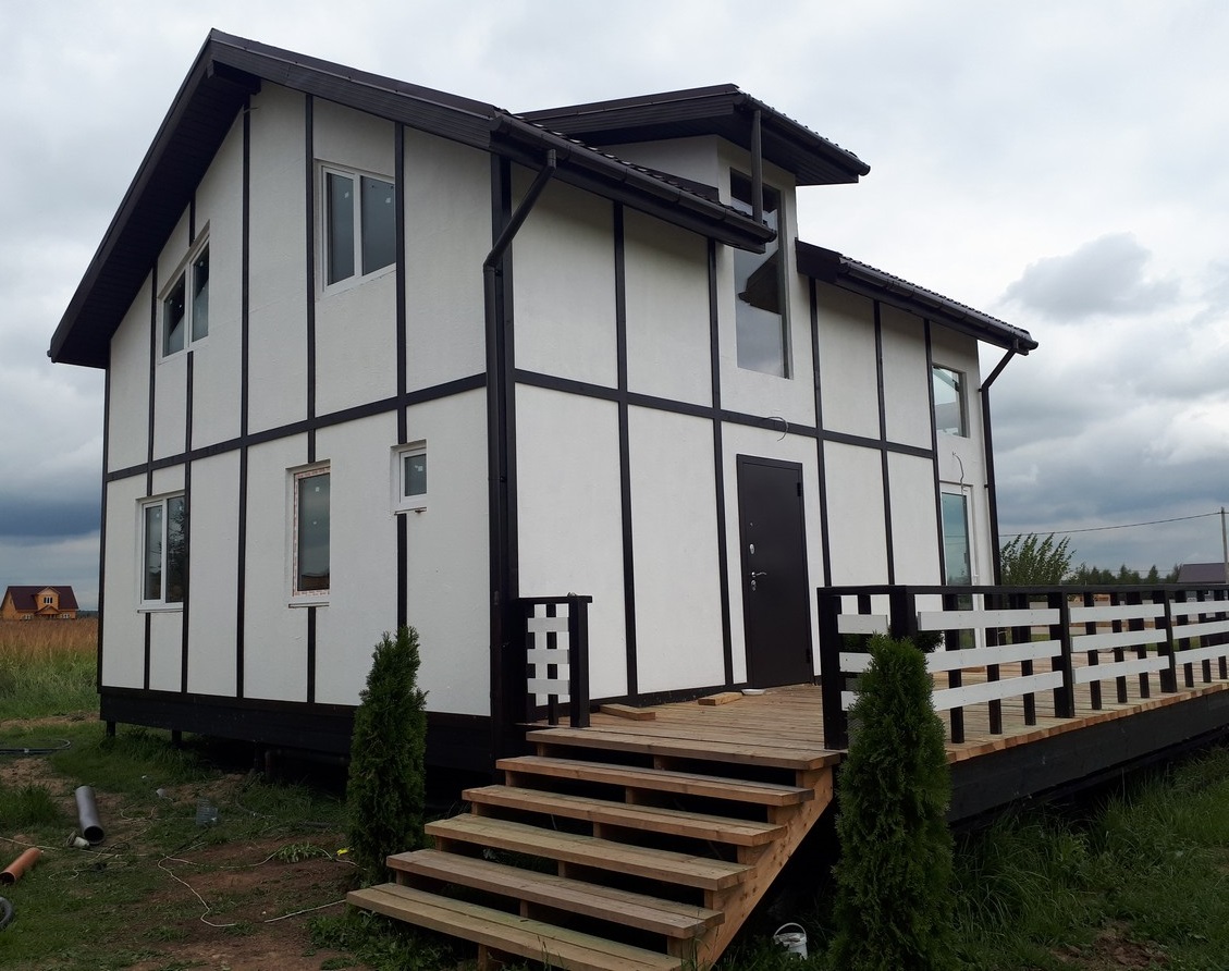 Деревянный дом с отделкой ДСП